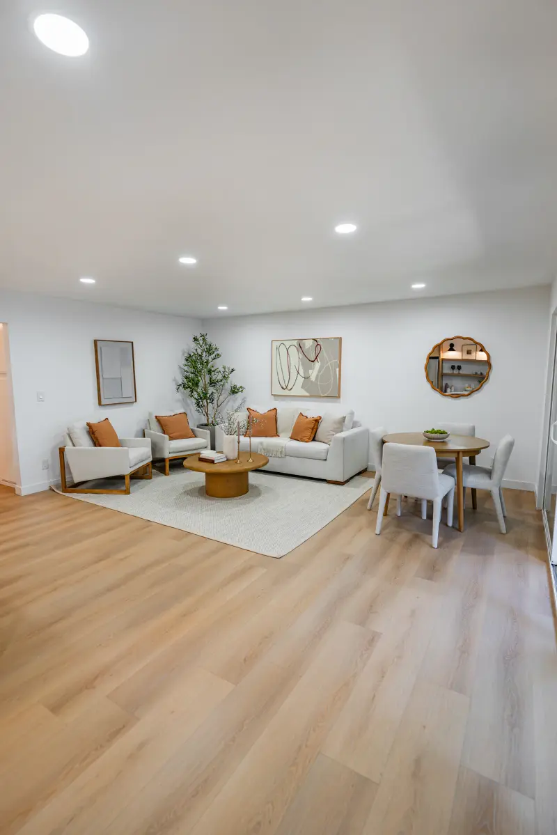 Living room with the dining nook beyond